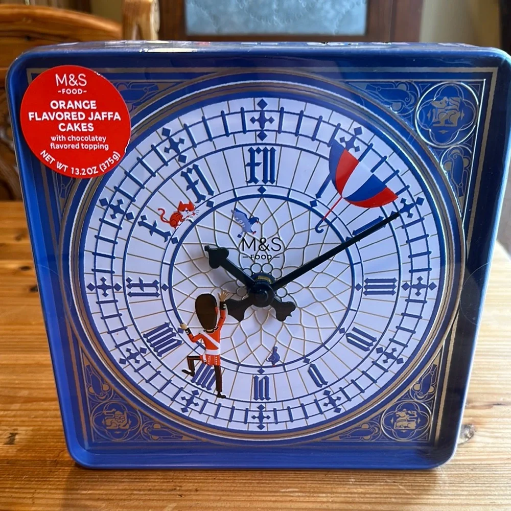 Marks and Spencer Blue and White Tin Clock